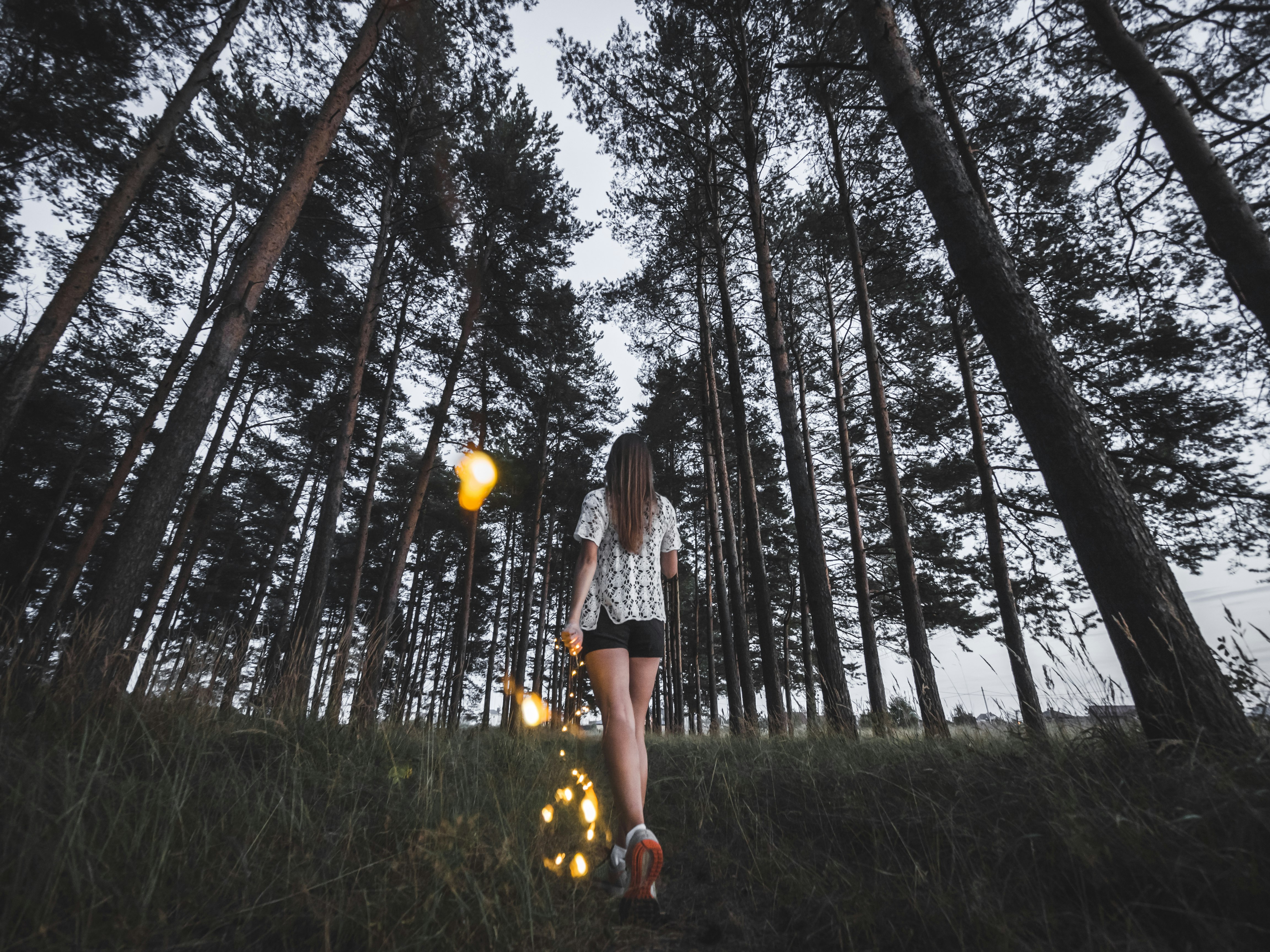 woman walking in forest